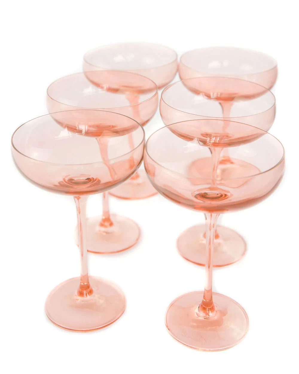 https://stanleykorshak.com/cdn/shop/products/Estelle-Colored-Glass-Champagne-Coupe-Stemware-in-Pink-11359662-1.jpg?v=1663340172